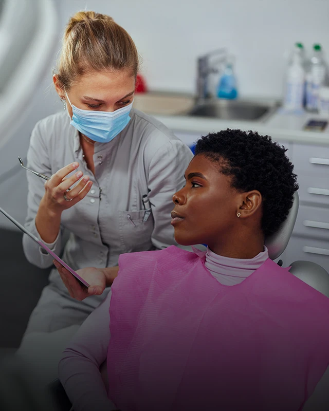 Dentist Woman In Office For A Dental Exam Services 640x800 Moto